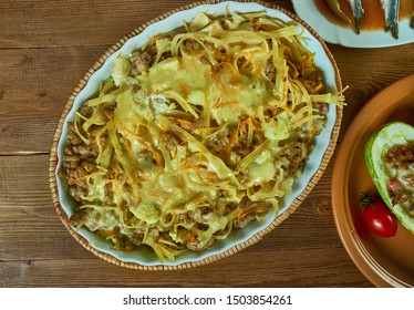 Spaghetti Squash Casserole With Ground Turkey, Tomatoes And Italian Spices.