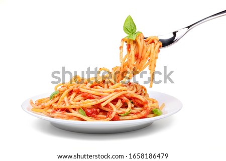 Spaghetti with tomato and basil on white background.