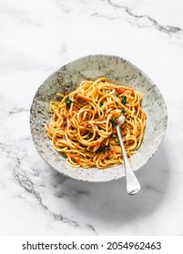 Spaghetti With Tomatoes Canned Tuna Sauce On A Light Background, Top View