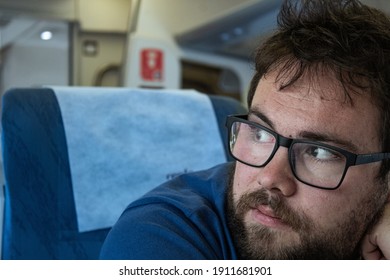 León, Spain: 06.07.2019: Young Man Sitting On The Inside Of A Train