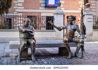 Spain, Dec 2021: Don Quijote and Sancho Panza sculptures in the street of Alcalá de Henares, Spain