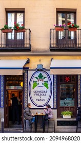 Spain, Dec 2021: People Drinking Beer And Eating Tapas In Tapas Bar 