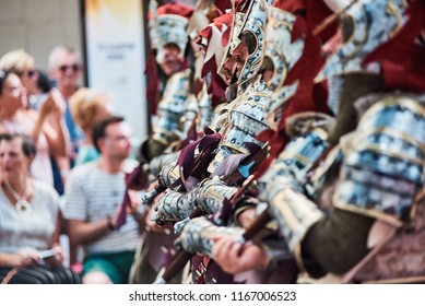 Spain Denia 15 August 2018. Disguised in beautiful bright costumes for the holiday of christian and moors spanish people in fiesta - Shutterstock ID 1167006523