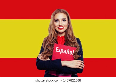 Spain. Happy student girl with red book against the spanish flag background. Travel and learn spanish language. Book with inscription Spanish on spanish language