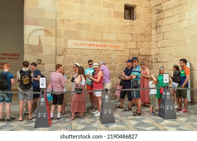 Málaga, Spain, June 13, 2022; Tourists Wait At The Entrance To The Picasso Museum In The City Of  Málaga.