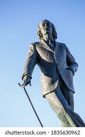 Cadaqués, Spain. June 20, 2015. Sculpture Representing The Famous Spanish Painter Salvador Dalí Made In Bronze By Ros Sabaté In 1971.