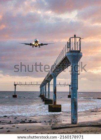 Tías, Spain - October 24, 2021: Approach viewpoint. It's located on the promenade, so it's possible to observe the planes landing from a very close distance.