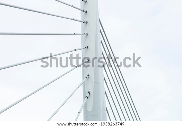 span bridge,\
metal ropes hold the structure\
