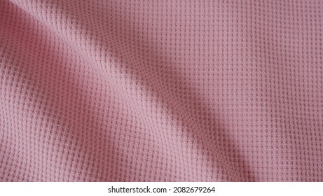 Spandex Jersey Knit Fabric Texture With Elegance And Drapery Textile Patterns In Soft Pink Color. Luxury And Beautiful Fabric Material.