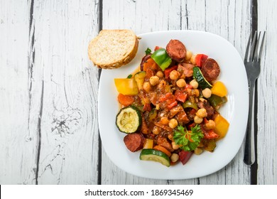 Spanish cauldron - stew with chickpeas, zucchini and chorizo sausage