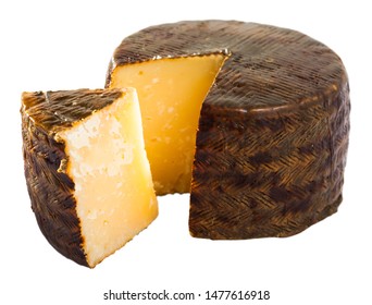 Spanish Cheese Queso Manchego From Milk Of Sheep With Cut Piece. Isolated Over White Background
