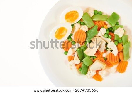 Spanish cuisine mixed vegetables with boiled egg(Menestra de Verduras)