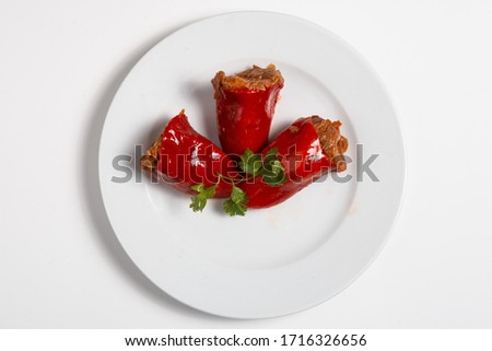 Spanish cuisine. Sweet peppers stuffed with meat. Pimientos del Piquillo rellenos de carne de ternera