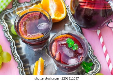 Spanish drink Sangria with red wine and summer fruits - Shutterstock ID 2206311037
