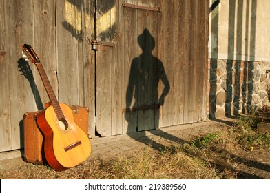 Spanish guitar and cowboy shadow