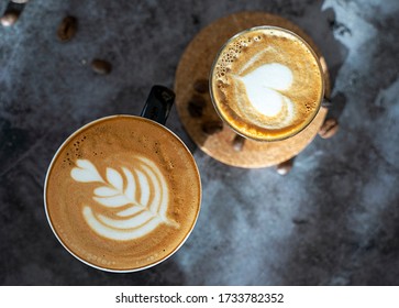 Spanish latte coffee cup concrete background latter art , coffee beans