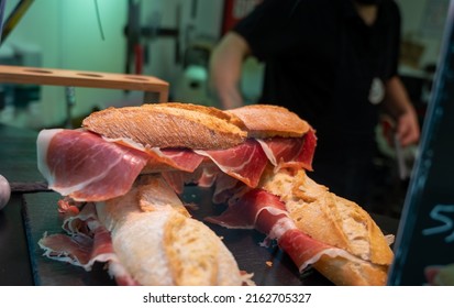 Spanish Low Cost Street Food, Bocadillo Bread Sandwich Dry-cured Ham Jamon Serrano Close Up