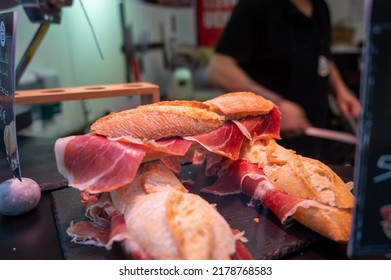 Spanish Low Cost Street Food, Bocadillo Bread Sandwich Dry-cured Ham Jamon Serrano Close Up