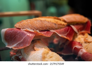 Spanish Low Cost Street Food, Bocadillo Bread Sandwich Dry-cured Ham Jamon Serrano Close Up