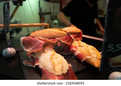 Spanish Low Cost Street Food, Bocadillo Bread Sandwich Dry-cured Ham Jamon Serrano Close Up