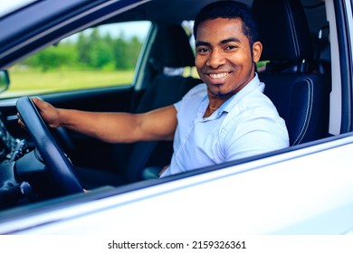 Spanish Man Driving His New Car At Spring Time At The Morning