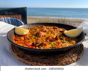 Spanish Paella On A Beach In Spain, Foto Taken In Marbella, Malaga. Delicious Spanish Food.