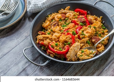 Spanish paella with prawns, chicken, chorizo and red pepper - high angle view