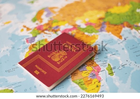 Spanish Passport On The World Map. Travel Concept, Identification, Security And Boarding. 