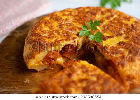 Spanish potato omelet with chistorra, a type of traditional chorizo ​​from the Basque country.