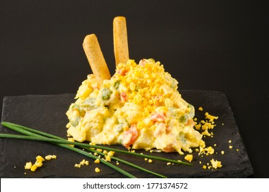 Spanish Tapas. Russian salad in black background. Ensaladilla rusa.Also know as Olivier Russian Potato Salad. - Shutterstock ID 1771374572