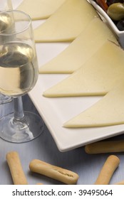 Spanish Tapas. Sliced Manchego Cheese. Sherry Wine. Typical Appetizer.