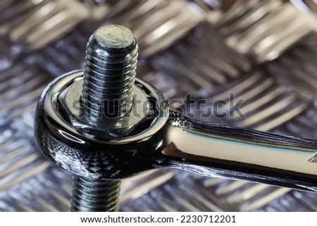 Spanner Tightening Hex Nut To Threaded Bolt