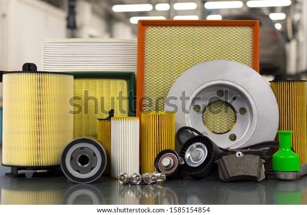 \
Spare parts for car.\
Original spare parts for a car close-up on the background of a car\
service.