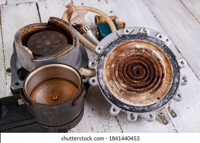 Spare Parts For The Coffee Machine. Repair Of Kitchen Appliances In The Workshop. Light Background.