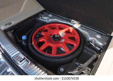 Spare Tire From The Car In The Trunk