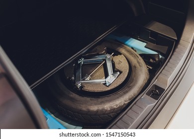 Spare Tire In The Trunk Of A Modern Car.