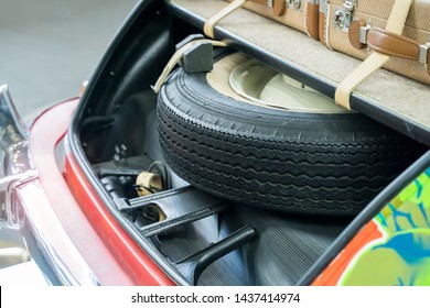 Spare Wheel In Storage Bin On A Car