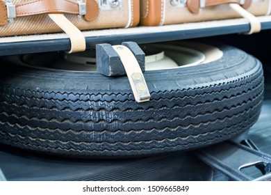 Spare Wheel In Storage Bin On A Car