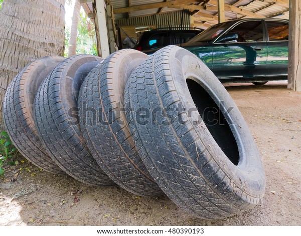 spare wheels, spare tires,\
Old Tires
