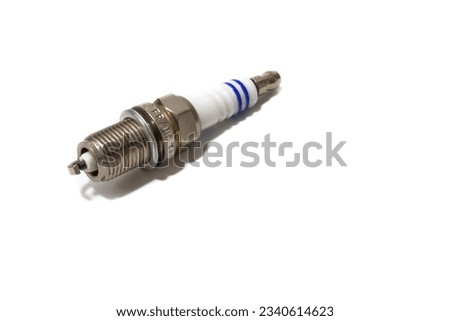 A spark plug isolated on a white background. The spark plug is the element that produces the ignition of the mixture of fuel and oxygen in the cylinders, by means of a spark, in a combustion engine.