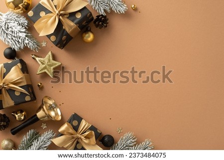 Spark your creativity with this Christmas scene. Top-view image of elegant gift packages, black and gold balls, star, sparkling confetti, delightful bell, frosted fir twigs on terracotta, text space