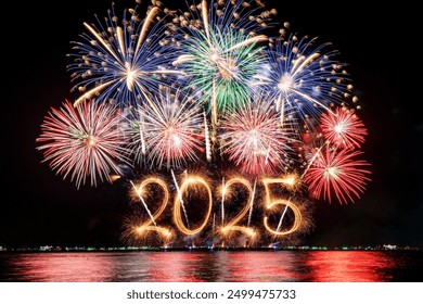 Sparkler 2025 text colorful firework illumination on dark blue sky background, happy new year 2025 concept - Powered by Shutterstock