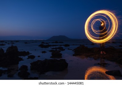 Sparkler Art - Spiral  Drawn By A Sparkler Stick In The Air, Long Exposure Beach Shot