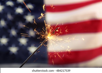 Sparkler On USA Flag Background