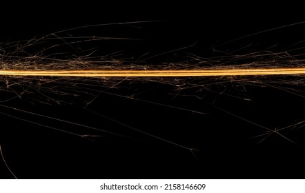 Sparkler Trail Of Light With Sparks In A Straight Line