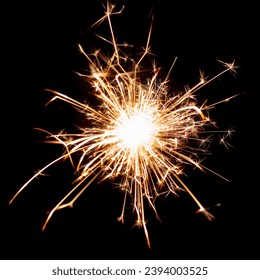 Sparklers on black isolated background. Sparks from a burning sparkler. To insert an image in a blend mode - Shutterstock ID 2394003525