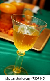 Sparkling Apple Cider In Fancy Glass On Holiday Table - Shallow Depth Of Field