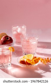 Sparkling Apple Cider In Pink Background