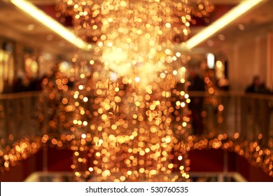Sparkling background made of lights. Festive blurred backdrop for holidays and parties.