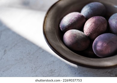 Sparkling Easter eggs dyed with natural ingredients such as red wine. Homemade naturally dyed eggs. Healthy eco option. - Powered by Shutterstock